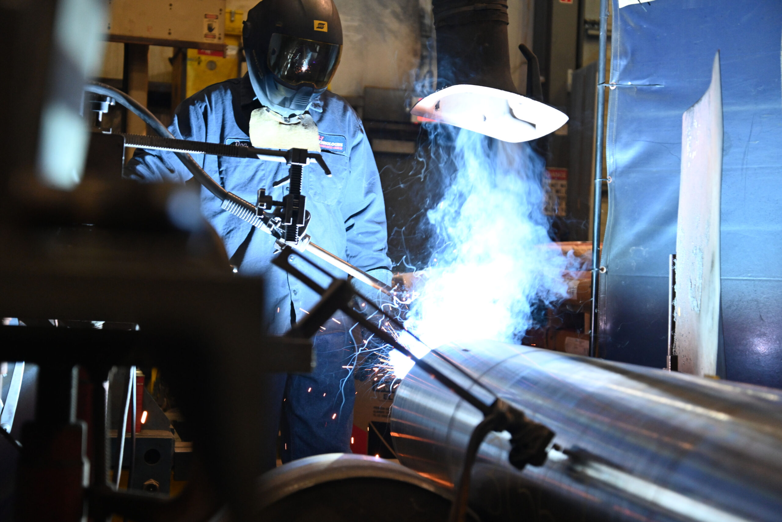 M-7 Technologies welder repairing a metal piece